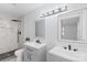 Bathroom showcasing dual vanities, matte black faucets, mirrors, and tiled walk-in shower at 1315 Vickie Ln, Matthews, NC 28104