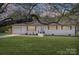 Inviting single-story home showcasing a well-maintained lawn and an attached garage for convenience at 1315 Vickie Ln, Matthews, NC 28104