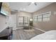 Relaxing bedroom with two large windows providing ample natural light and a comfortable chair at 135 Frostcliff Ln, Mooresville, NC 28117
