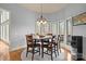 Dining room offers a bay window area and wooded views at 135 Frostcliff Ln, Mooresville, NC 28117