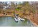 Beautiful lake view featuring a private boat dock and serene waterfront at 135 Frostcliff Ln, Mooresville, NC 28117