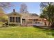 Spacious backyard with a well-maintained lawn and deck at 15327 Rush Lake Ln, Huntersville, NC 28078