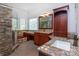 Luxury bathroom with walk-in shower, dual sink vanity, granite countertops, and wood cabinets at 15327 Rush Lake Ln, Huntersville, NC 28078