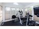 Workout room with a variety of exercise equipment at 15327 Rush Lake Ln, Huntersville, NC 28078