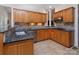 A well-equipped kitchen features stainless steel appliances, granite countertops, and tile backsplash at 15327 Rush Lake Ln, Huntersville, NC 28078