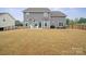 This home features a spacious backyard with a patio at 19412 Bird Meadow Dr, Huntersville, NC 28078