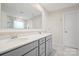 Bathroom with double sinks, modern vanity, and large mirror at 19412 Bird Meadow Dr, Huntersville, NC 28078