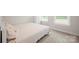 This bedroom features neutral walls, carpet, and bright natural lighting at 19412 Bird Meadow Dr, Huntersville, NC 28078