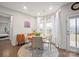 Charming dining area with a round table, stylish chairs, and natural light at 19412 Bird Meadow Dr, Huntersville, NC 28078