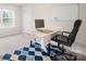 This office space has carpeted floors and bright natural lighting at 19412 Bird Meadow Dr, Huntersville, NC 28078