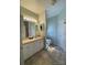 Bright bathroom with a vanity, a large mirror, and ample cabinet space at 201 Fancy Lady Ct, York, SC 29745