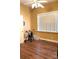 Comfortable bedroom with hardwood floors and a large window providing natural light at 201 Fancy Lady Ct, York, SC 29745