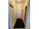 Inviting hallway with neutral walls and flooring, leading to various rooms at 201 Fancy Lady Ct, York, SC 29745