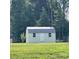 Backyard shed with double doors and a metal roof at 201 Fancy Lady Ct, York, SC 29745