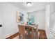 Cozy dining room featuring hardwood floors and a window with natural light at 2208 Bay St, Charlotte, NC 28205