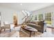 Comfortable living room featuring neutral furniture, hardwood floors and ample natural light at 2208 Bay St, Charlotte, NC 28205