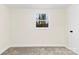 Well-lit bedroom with new carpet, one window and neutral paint at 2706 Booker St, Gastonia, NC 28054