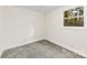 Nicely sized bedroom with new carpet, one window and neutral paint at 2706 Booker St, Gastonia, NC 28054