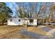 Charming single-story home featuring a covered carport and a welcoming front porch at 2706 Booker St, Gastonia, NC 28054