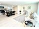 Bright and open living room seamlessly flows into the kitchen and dining area at 2706 Booker St, Gastonia, NC 28054