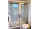 Modern bathroom with glass shower enclosure and large vanity at 2916 Grand Union Way, Charlotte, NC 28209