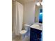 Bathroom with white toilet, vanity, and shower/tub combination with shower curtain at 2916 Grand Union Way, Charlotte, NC 28209