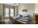 Bedroom with bright window light features two twin beds at 2916 Grand Union Way, Charlotte, NC 28209