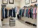 Organized walk-in closet with ample shelving and hanging space for clothing and accessories at 2916 Grand Union Way, Charlotte, NC 28209