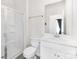 Modern bathroom featuring a glass shower, white fixtures, and a clean, minimalist design at 3013 Whipcord Dr, Waxhaw, NC 28173