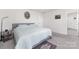 Serene bedroom with a comfortable bed, side table, and soft carpeting at 3013 Whipcord Dr, Waxhaw, NC 28173