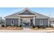 Inviting entrance to the community with a well-maintained building and manicured landscaping at 3013 Whipcord Dr, Waxhaw, NC 28173