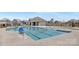 Resort-style community pool with ample seating and pristine water, surrounded by beautifully landscaped grounds at 3013 Whipcord Dr, Waxhaw, NC 28173