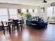 Spacious living room with hardwood floors, modern furniture, and lots of natural light at 3013 Whipcord Dr, Waxhaw, NC 28173