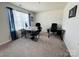 Bright office with two desks, black office chairs, and natural light at 3013 Whipcord Dr, Waxhaw, NC 28173