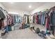 Spacious walk-in closet with ample storage and organization solutions for clothes and accessories at 3013 Whipcord Dr, Waxhaw, NC 28173