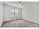 Bedroom featuring a window and neutral carpet at 3023 Fairglen Rd, Charlotte, NC 28269