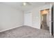 Bedroom featuring neutral carpet and a closet at 3023 Fairglen Rd, Charlotte, NC 28269