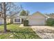 Charming home with well-maintained lawn, two-car garage and mature trees in a suburban neighborhood at 3023 Fairglen Rd, Charlotte, NC 28269