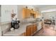 Functional kitchen featuring oak cabinets, neutral countertops, and modern appliances at 3048 Misty Harbor Cir # E, Cramerton, NC 28032