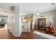 Open-concept kitchen featuring oak cabinets, hardwood floors, and a cozy dining nook at 3048 Misty Harbor Cir # E, Cramerton, NC 28032