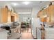 Functional kitchen featuring oak cabinets, modern appliances, and natural light at 3048 Misty Harbor Cir # E, Cramerton, NC 28032
