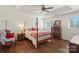 Spacious main bedroom features tray ceilings, four-poster bed, and neutral walls at 3048 Misty Harbor Cir # E, Cramerton, NC 28032