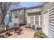 Charming outdoor patio with string lights, seating, and privacy fence, perfect for entertaining or relaxing at 3048 Misty Harbor Cir # E, Cramerton, NC 28032