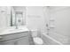 Well-lit bathroom with single vanity and shower-tub combo at 3052 Ora Smith Rd, Lincolnton, NC 28092