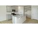 Kitchen with granite countertops, kitchen island and stainless steel appliances at 3052 Ora Smith Rd, Lincolnton, NC 28092