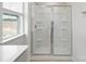 Bathroom glass-enclosed shower with tile surround at 3052 Ora Smith Rd, Lincolnton, NC 28092
