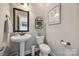 Half bathroom featuring a pedestal sink and toilet at 324 Kerrydale Ct # 106, Clover, SC 29710