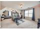 Large bedroom featuring carpet, a couch, and ceiling fan at 324 Kerrydale Ct # 106, Clover, SC 29710