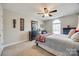 Bedroom featuring carpet, two dressers and a bed with a red white and blue blanket at 324 Kerrydale Ct # 106, Clover, SC 29710