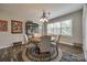 Bright breakfast nook with round table, patterned rug, and a window view at 324 Kerrydale Ct # 106, Clover, SC 29710